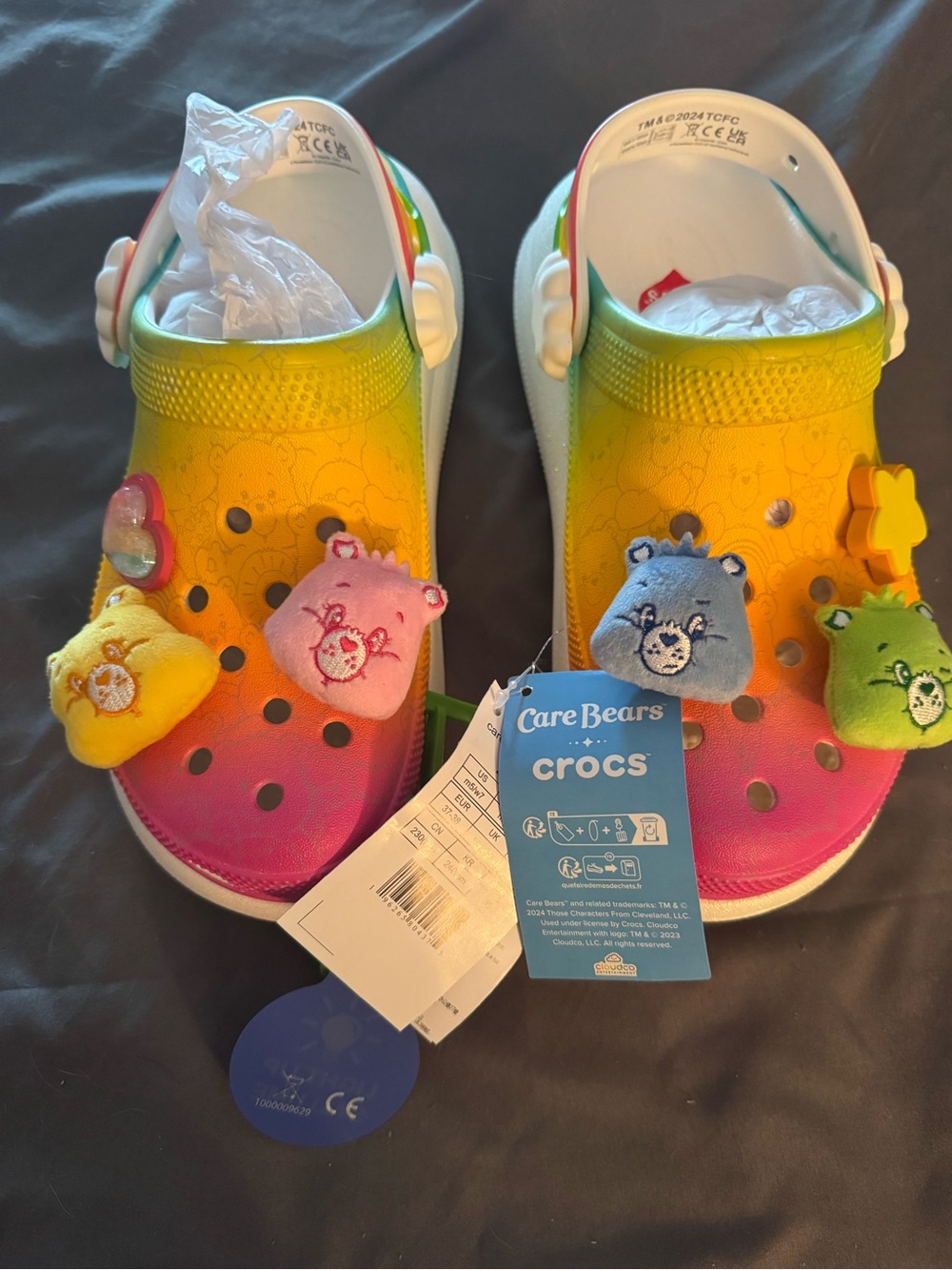 CROCS womens sz 7 Care Bears Rainbow Gradient Clog - Yellow Pink Blue Green